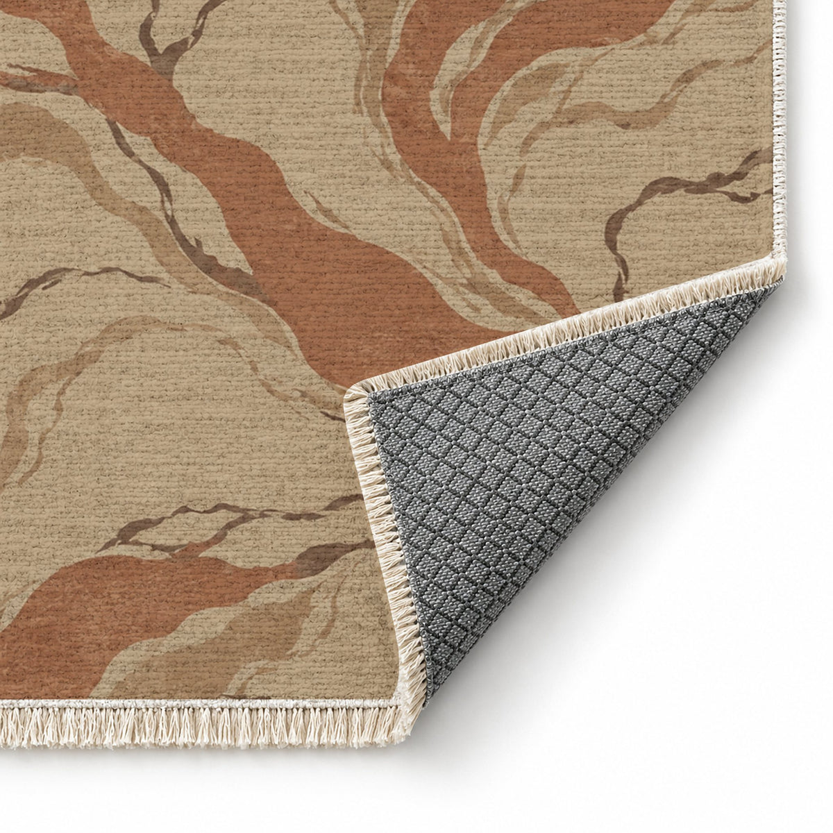 Riverbed Sand & Terracotta washable rug folded corner showing the backing