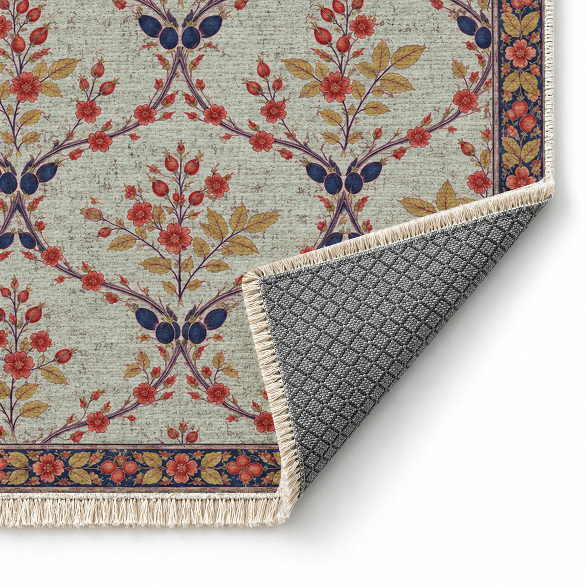 Rosehip Espalier Glacier, Ink & Vermilion washable rug folded corner showing the backing
