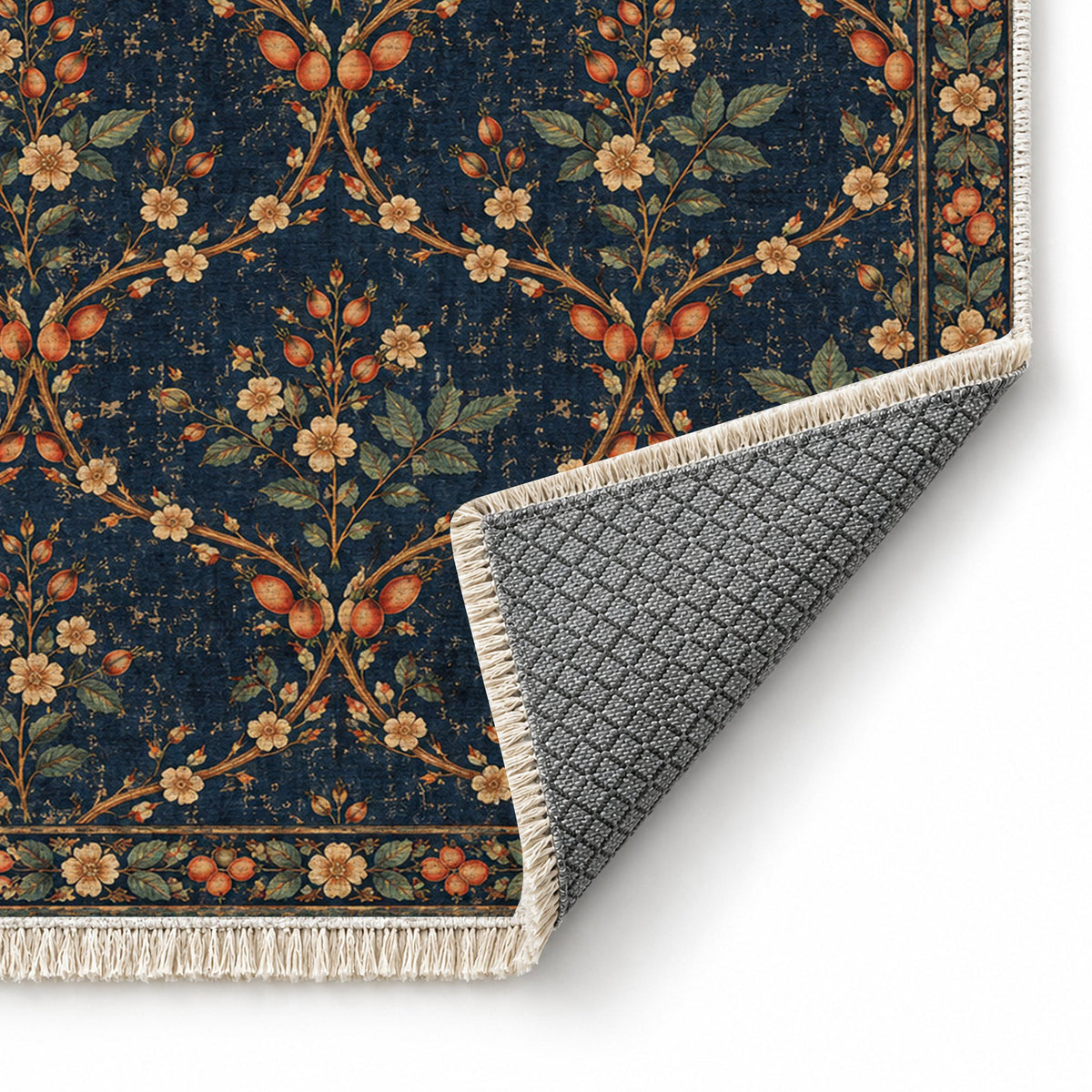 Rosehip Espalier Midnight & Melon washable rug folded corner showing the backing
