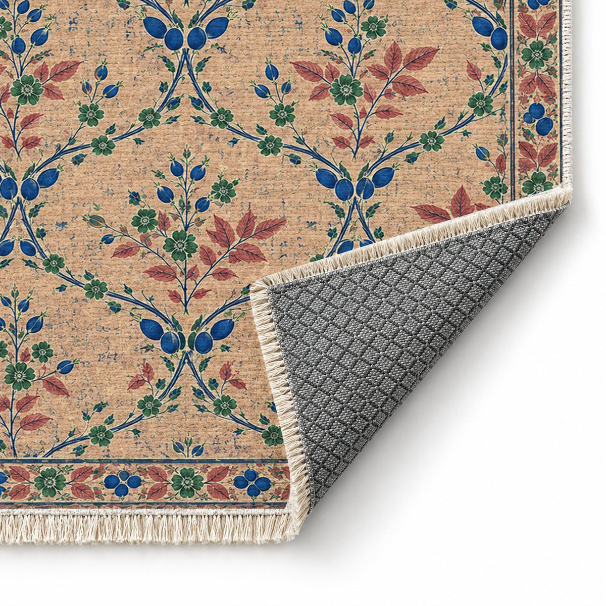 Rosehip Espalier Peach, Cobalt & Jade washable rug folded corner showing the backing