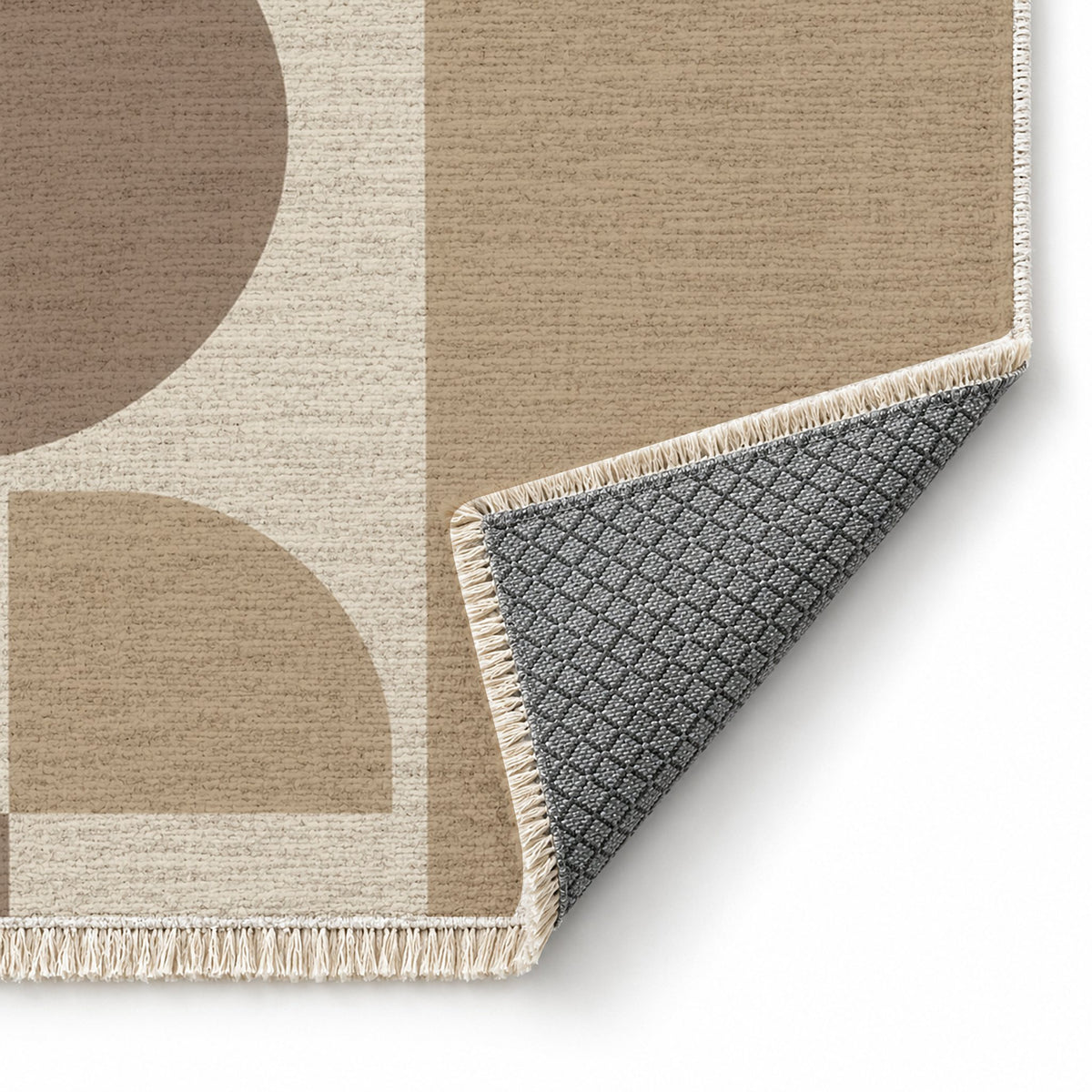 Rounded Blocks Ivory & Sand washable rug folded corner showing the backing