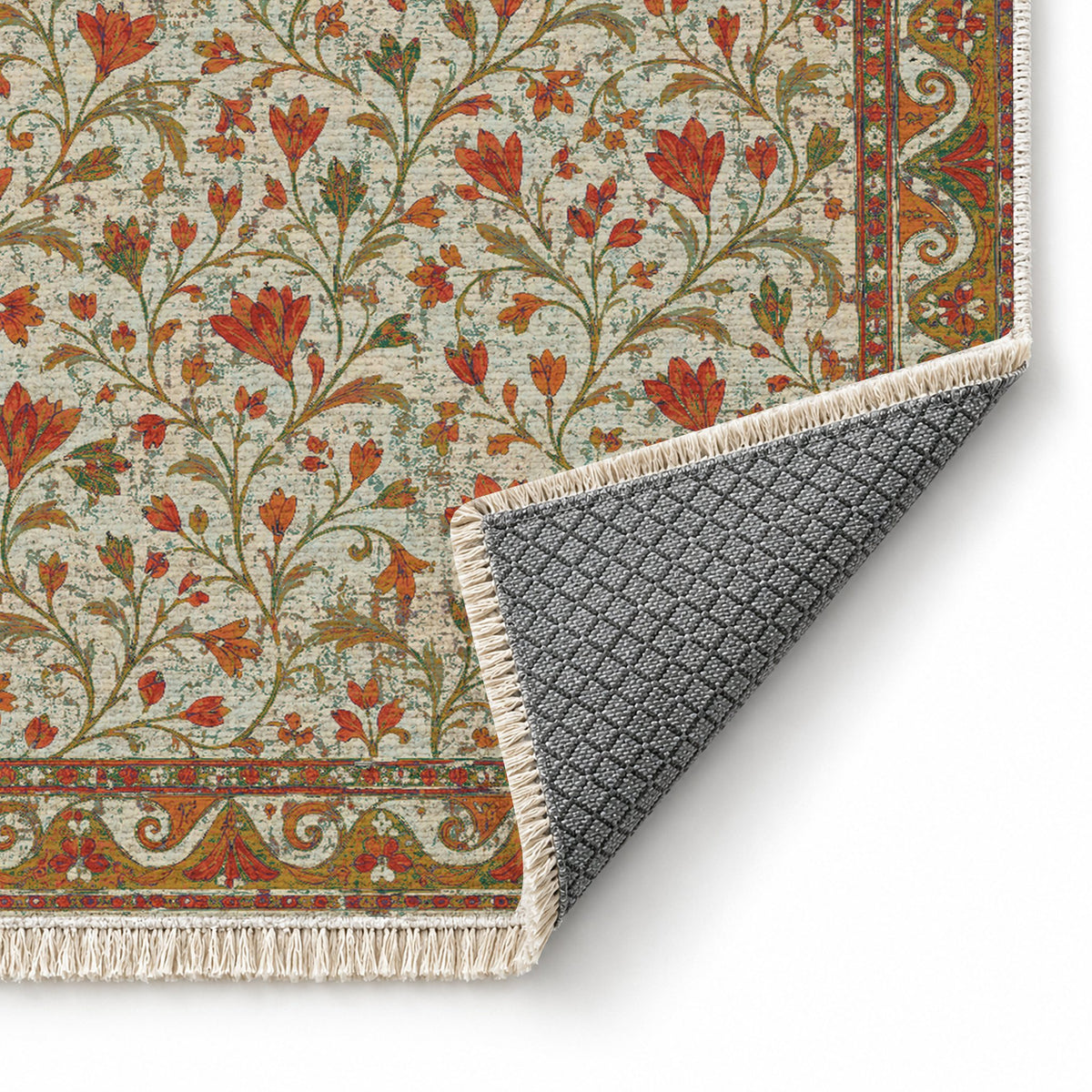 Saffron Court Emerald & Terracotta washable rug folded corner showing the backing