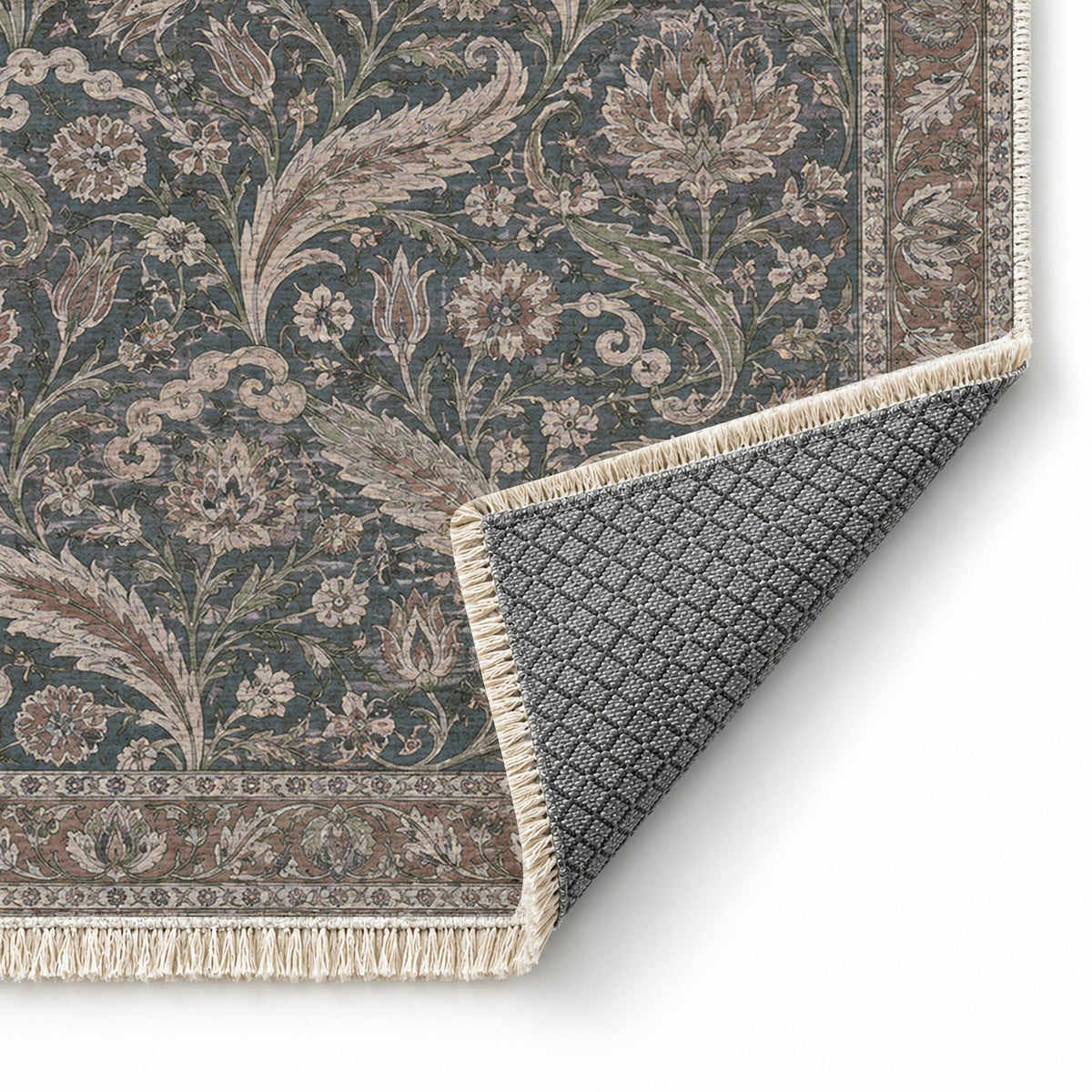 Saz Court Graphite & Linen washable rug folded corner showing the backing