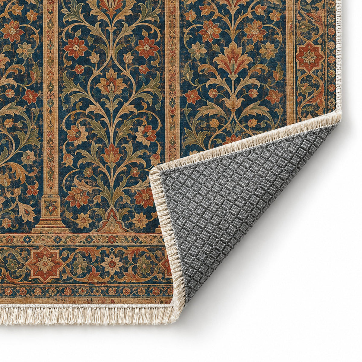Scalloped Arcade Indigo & Rust washable rug folded corner showing the backing