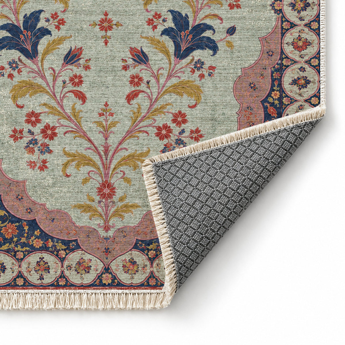 Scalloped Portal Glacier, Ink & Vermilion washable rug folded corner showing the backing
