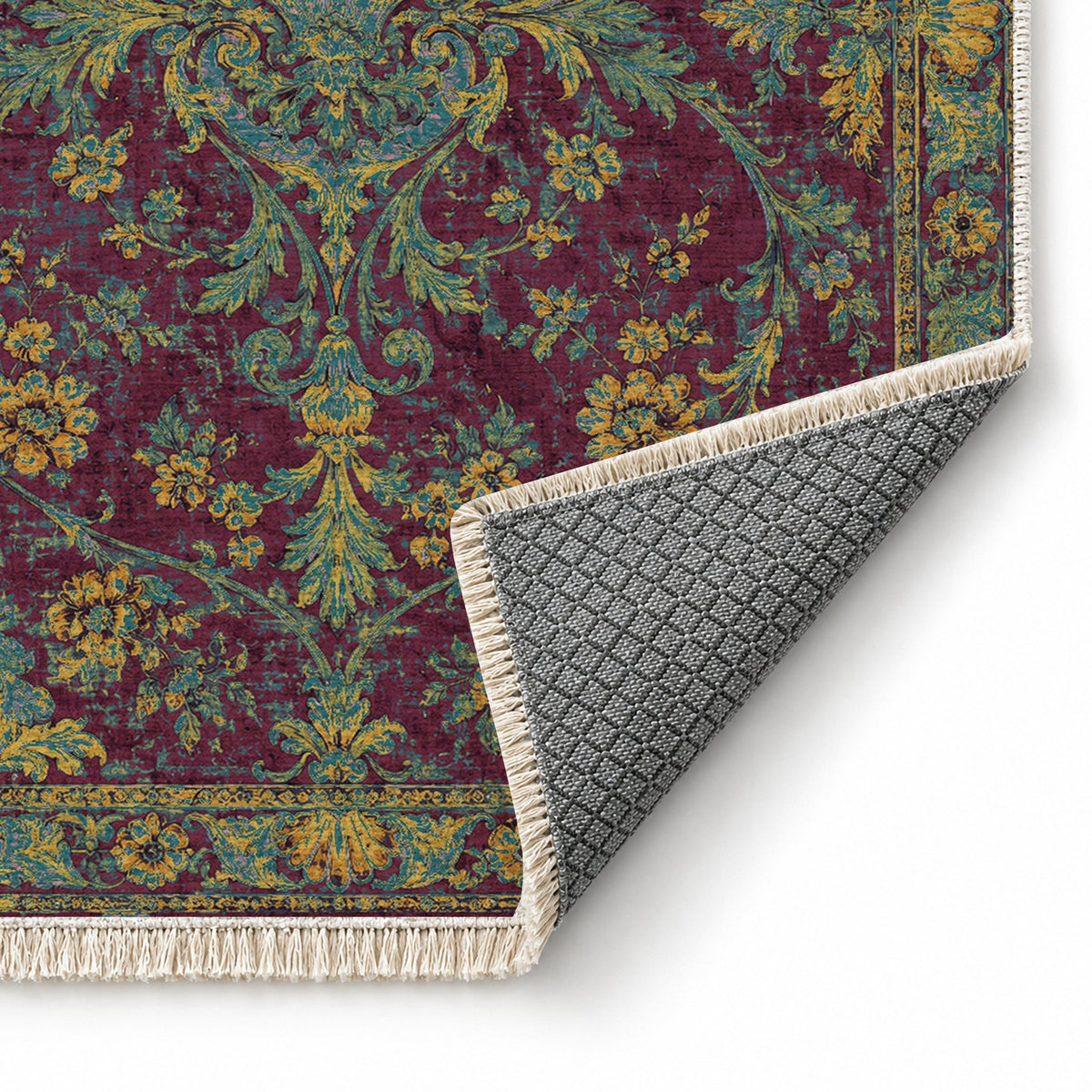 Shell Pavilion Burgundy & Teal washable rug folded corner showing the backing