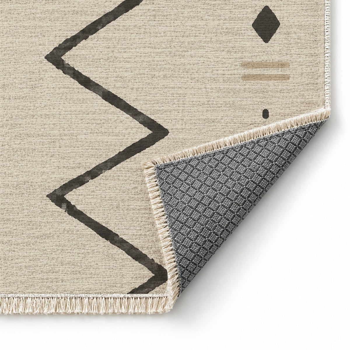 Single Path Ivory & Charcoal washable rug folded corner showing the backing
