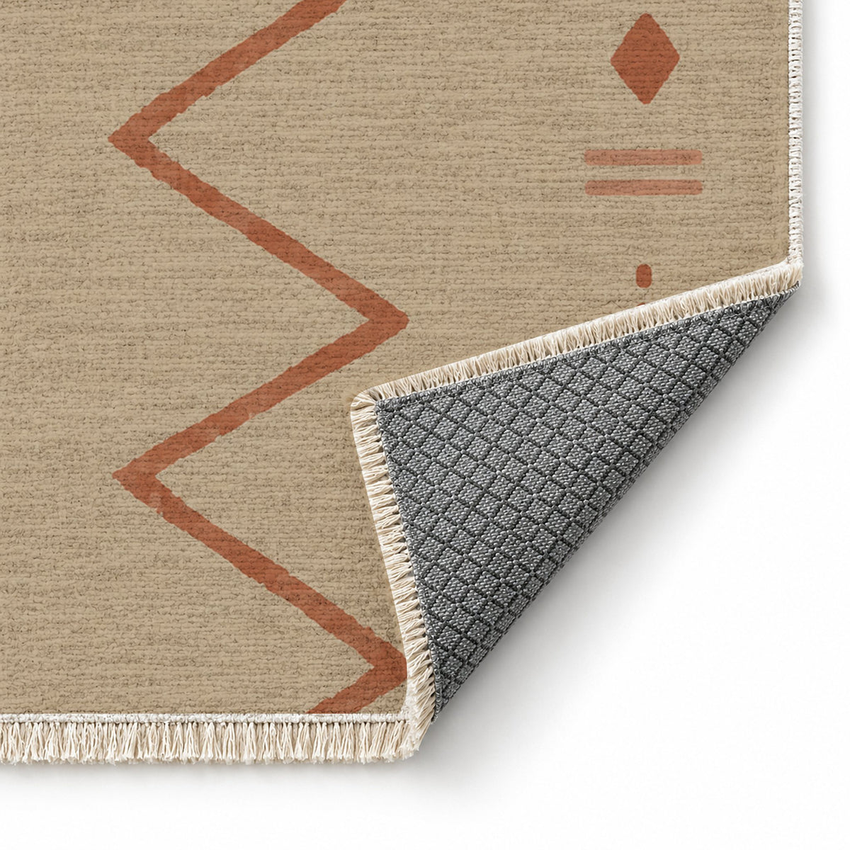 Single Path Sand & Terracotta washable rug folded corner showing the backing