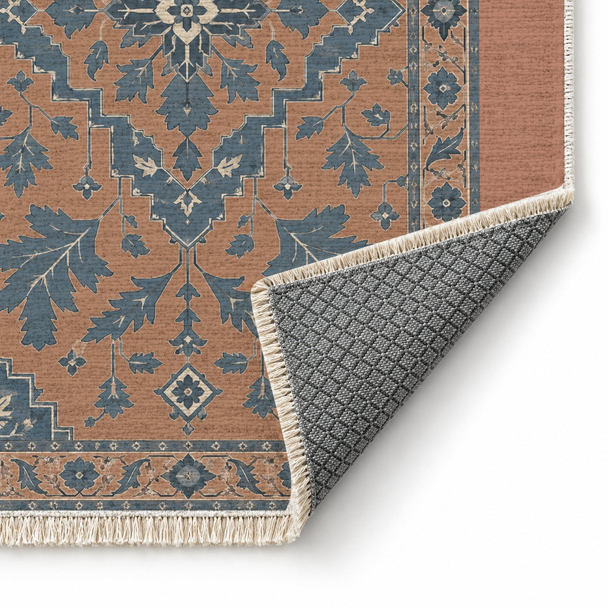 Soft Heriz Clay & Denim washable rug folded corner showing the backing
