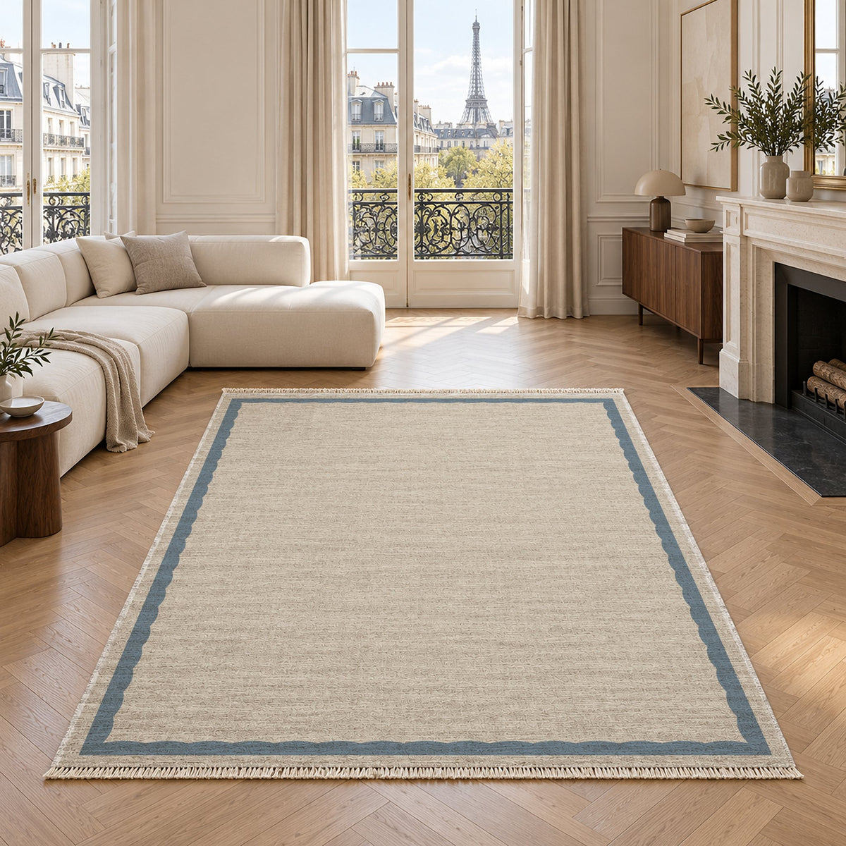 Soft Scallop Ivory & Dusty Blue washable rug in a living room with an Eiffel Tower view