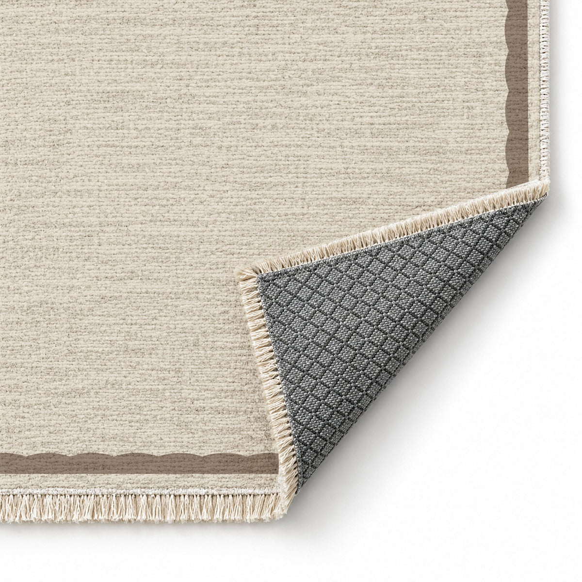 Soft Scallop Ivory & Taupe washable rug folded corner showing the backing