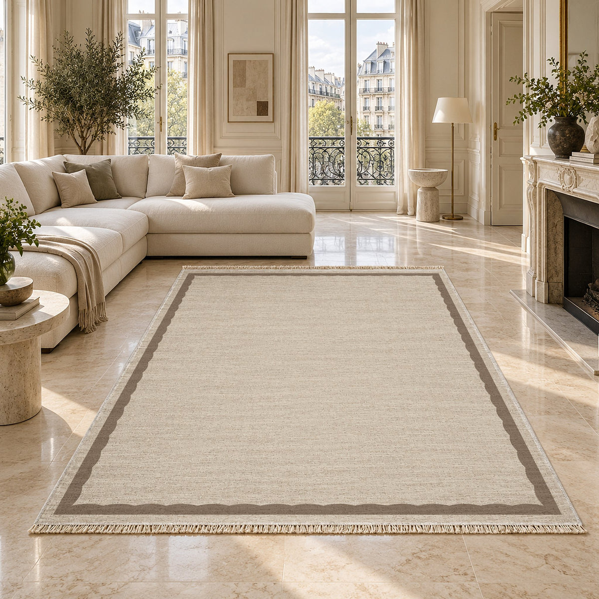 Soft Scallop Ivory & Taupe washable rug on a marble floor