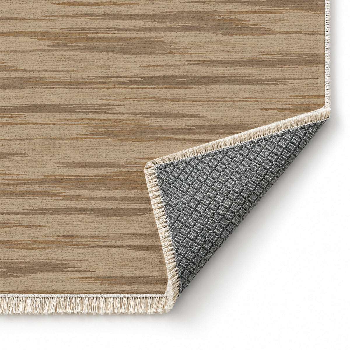 Soft Stria Sand & Taupe washable rug folded corner showing the backing