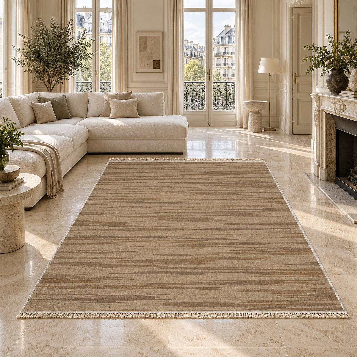 Soft Stria Sand & Taupe washable rug on a marble floor