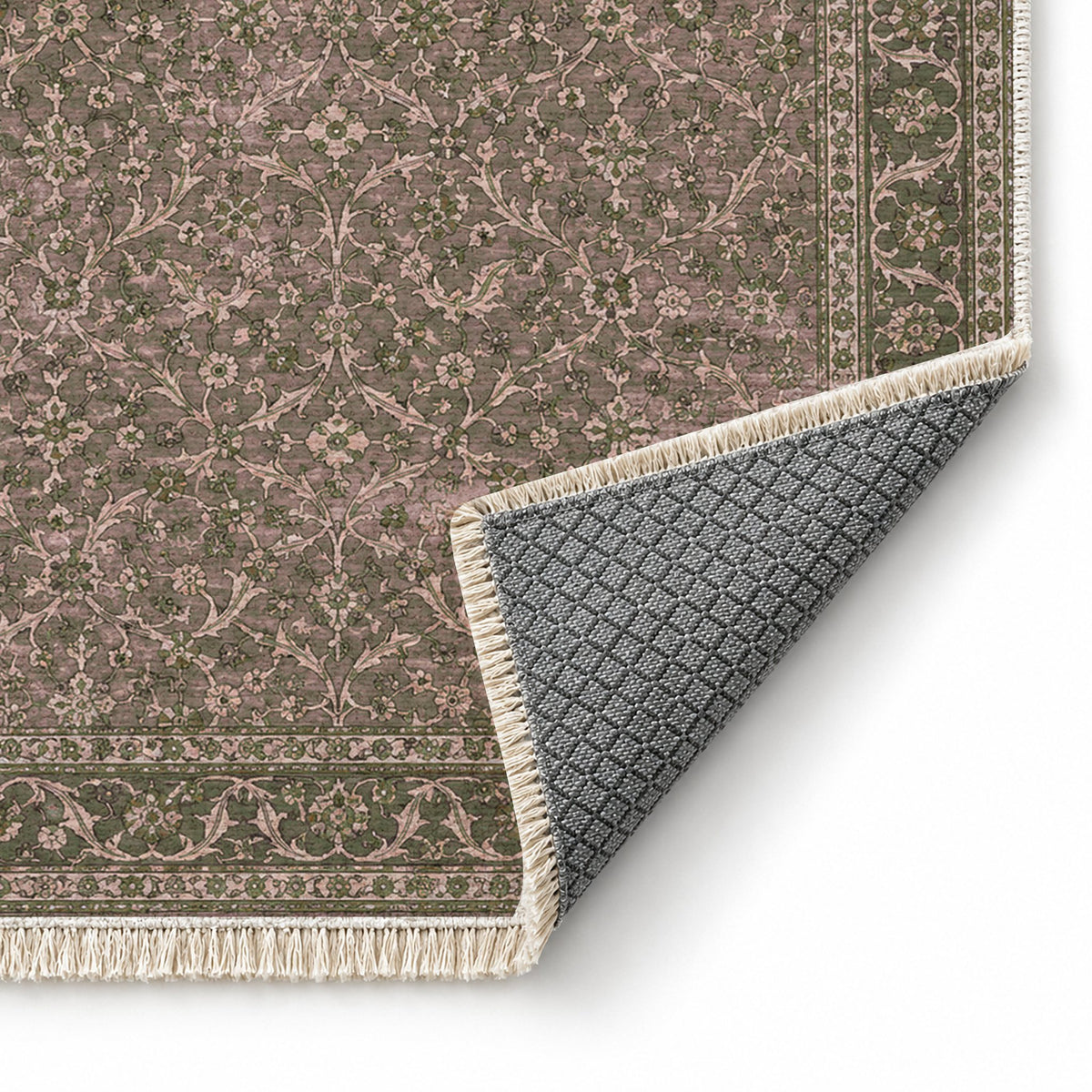 Split Leaf Network Rose & Olive washable rug folded corner showing the backing