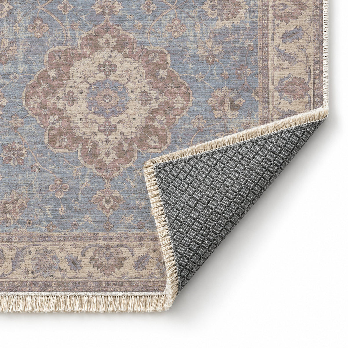 Spotted Medallions Graphite & Linen washable rug folded corner showing the backing