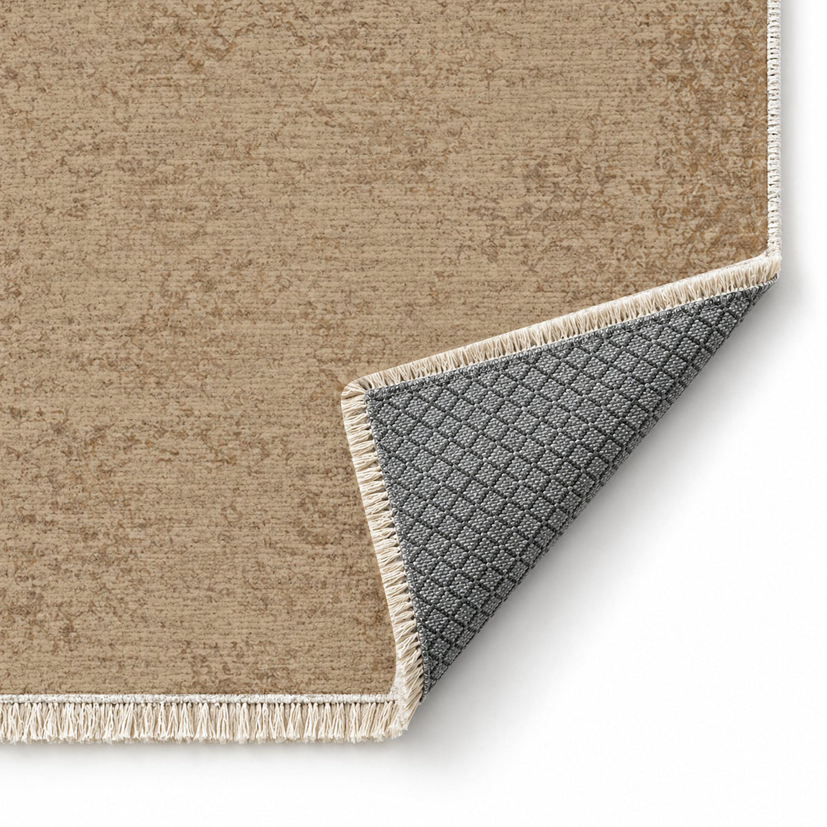 Stone Grain Sand & Taupe washable rug folded corner showing the backing