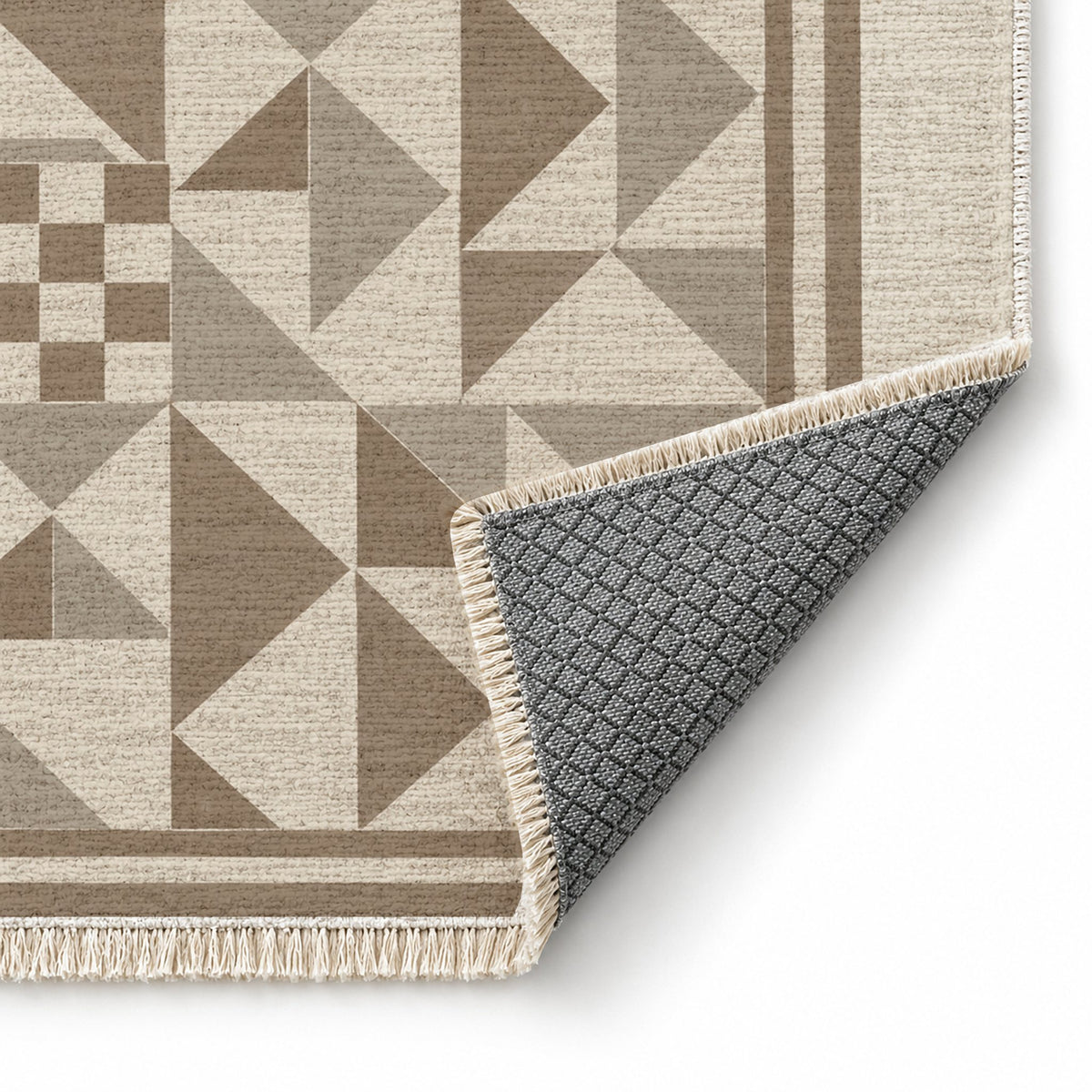 Sunwashed Mosaic Ivory & Taupe washable rug folded corner showing the backing