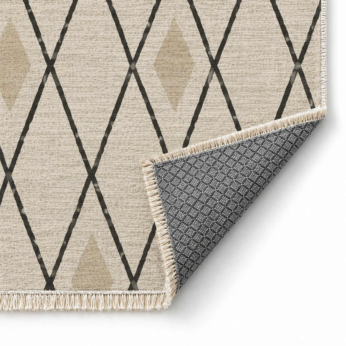 Tall Trellis Ivory & Charcoal washable rug folded corner showing the backing