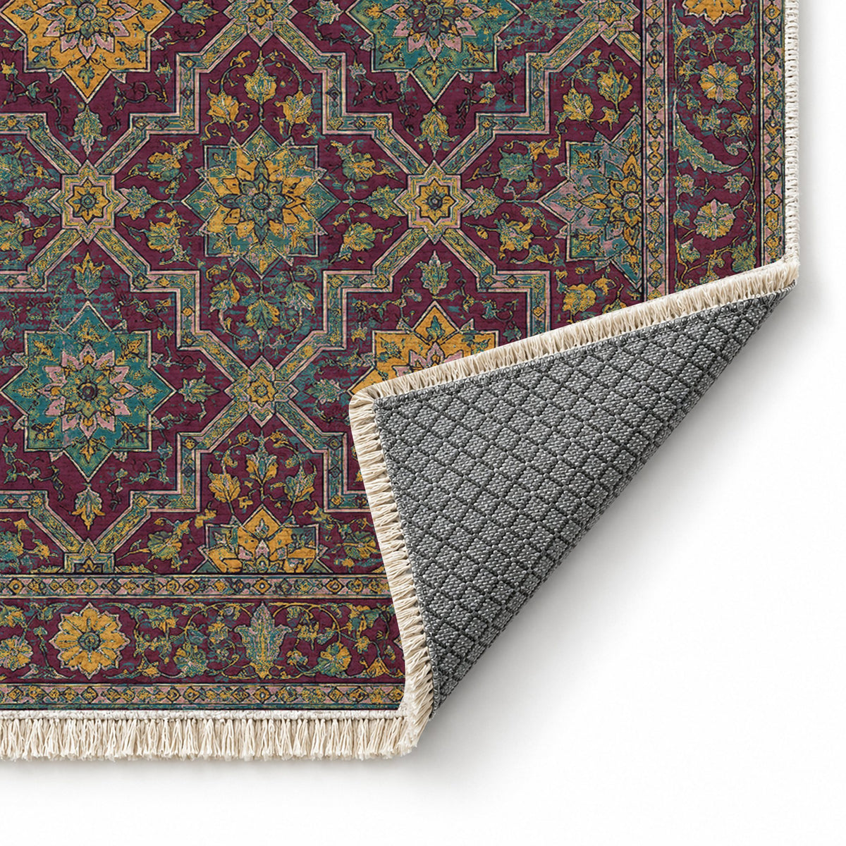 Tile Rosettes Burgundy & Teal washable rug folded corner showing the backing