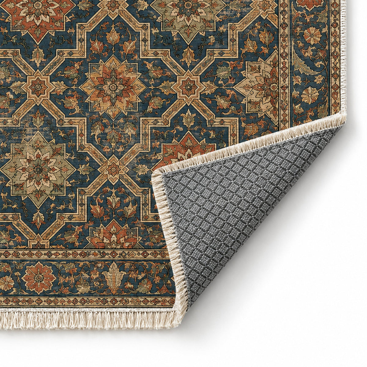 Tile Rosettes Indigo & Rust washable rug folded corner showing the backing