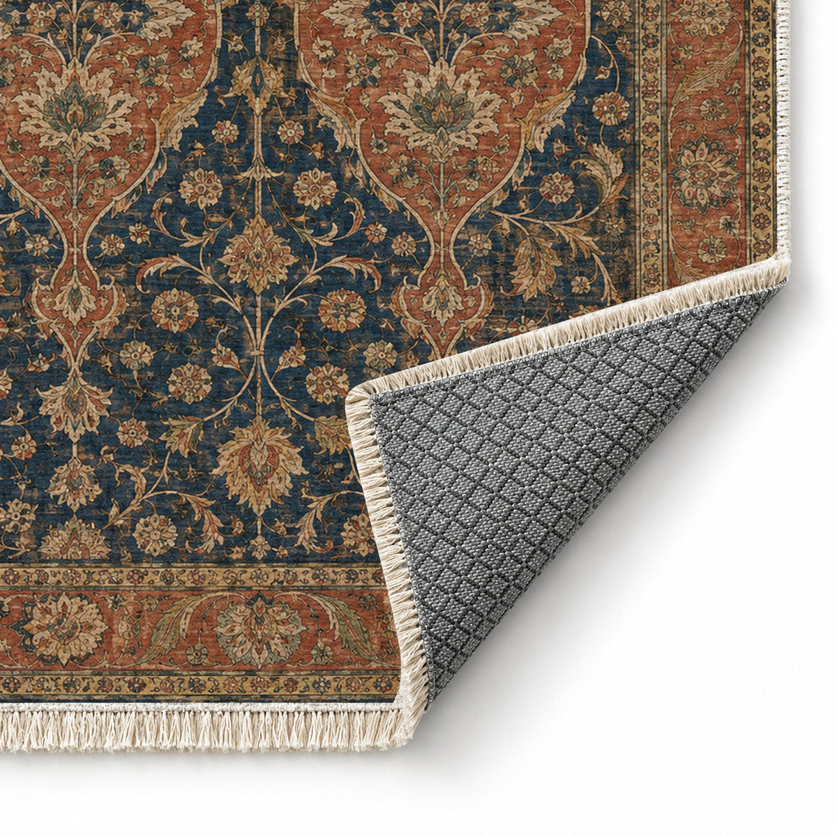 Twin Lanterns Indigo & Rust washable rug folded corner showing the backing