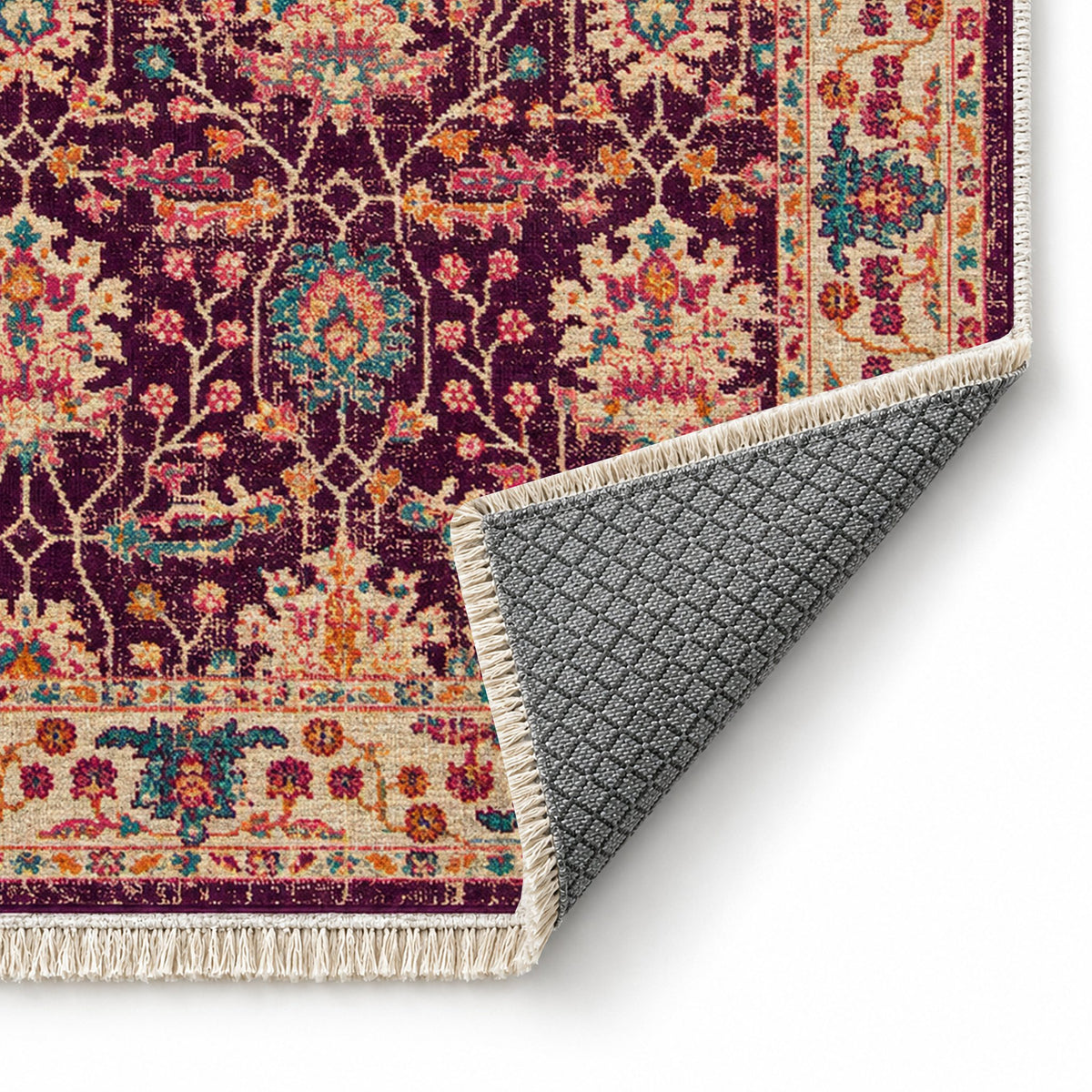 Vintage Floral 7652 Aubergine washable rug folded corner showing the backing