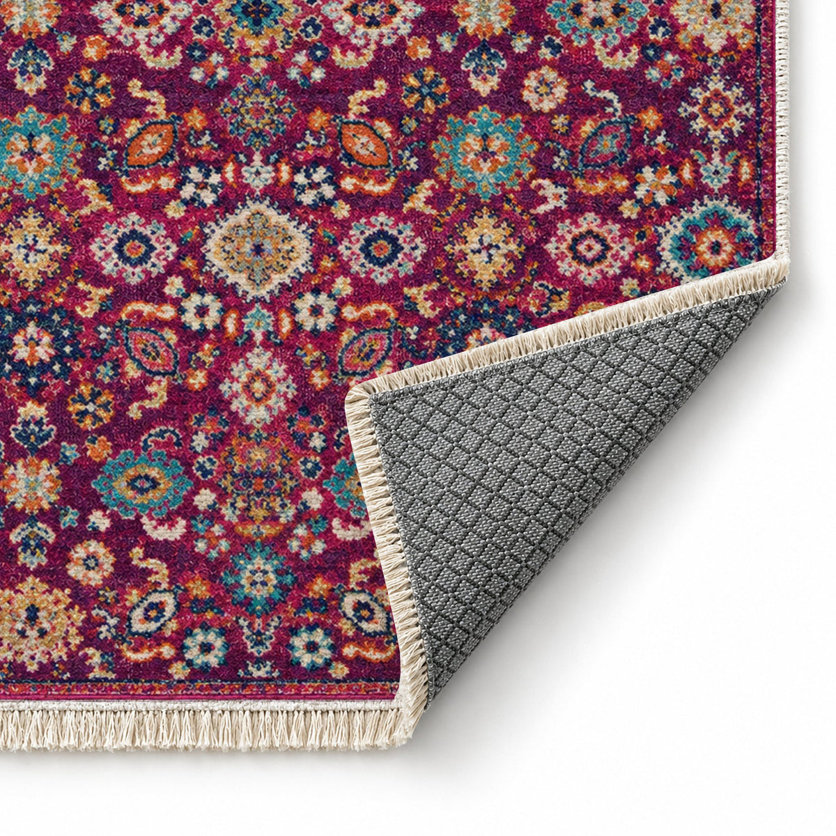 Vintage Floral 7653 Aubergine washable rug folded corner showing the backing