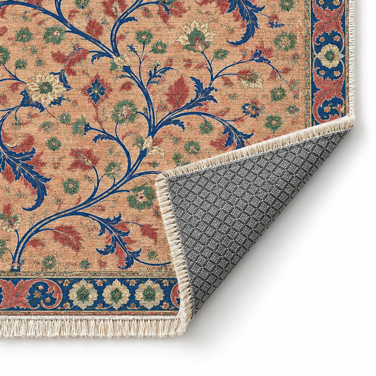 Weathered Scroll Atlas Peach, Cobalt & Jade washable rug folded corner showing the backing