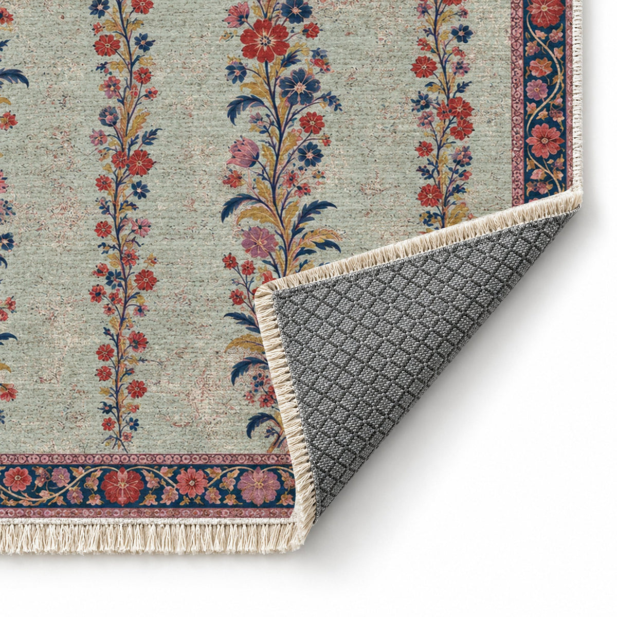 Wildflower Ribbons Glacier, Ink & Vermilion washable rug folded corner showing the backing