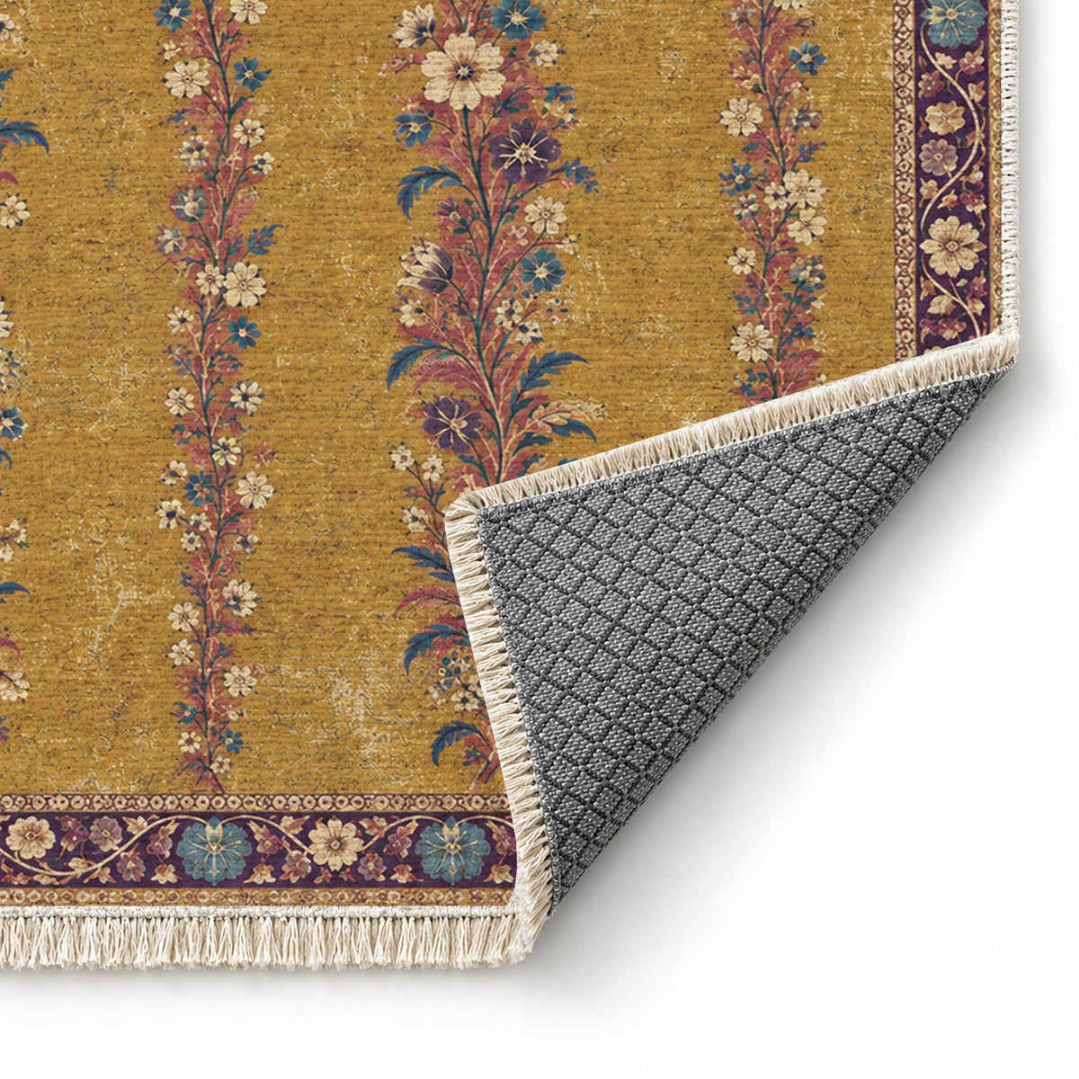 Wildflower Ribbons Golden, Plum & Azure washable rug folded corner showing the backing