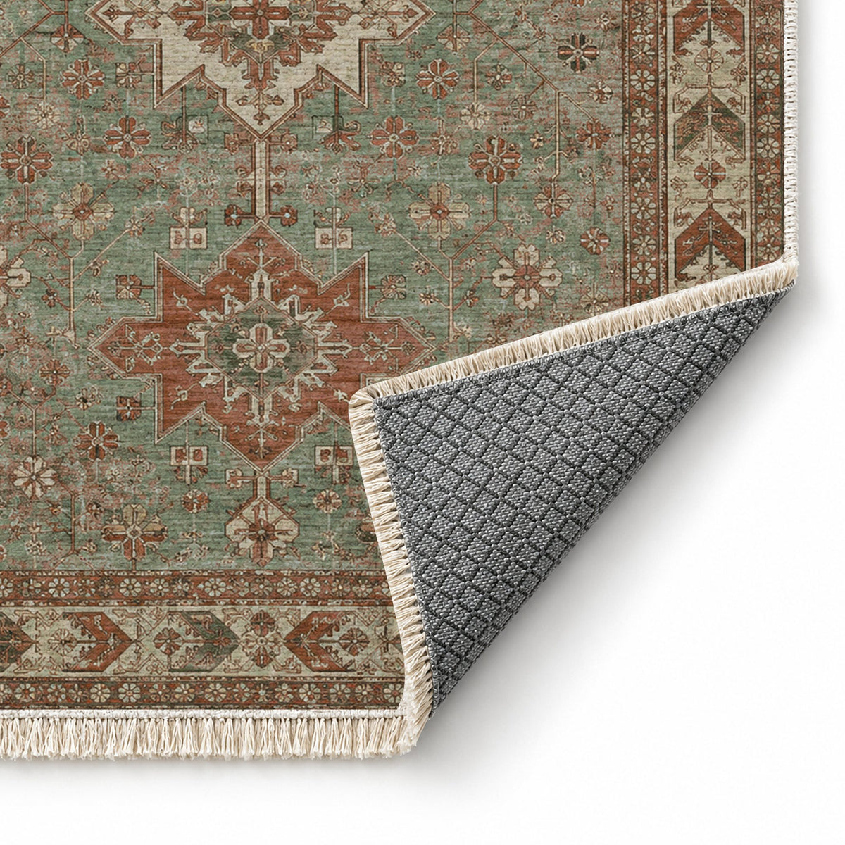 Yagcibedir Stars Clay & Sage washable rug folded corner showing the backing